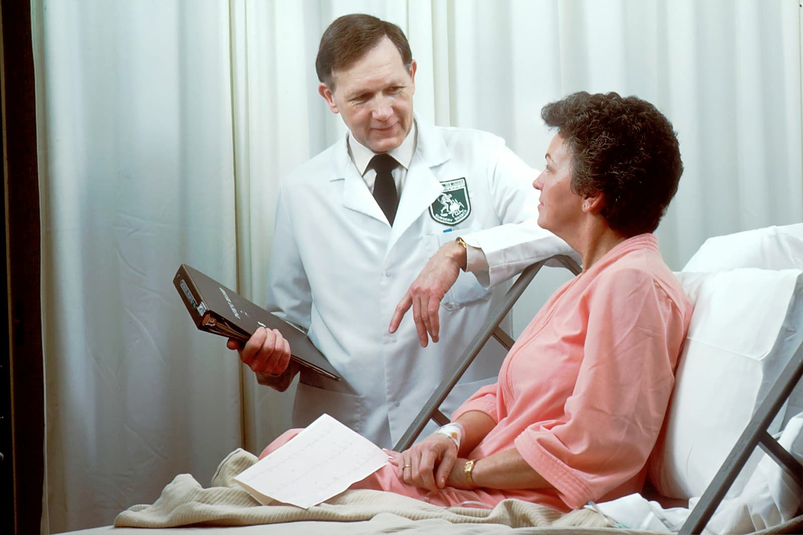 A nurse in a hospital corridor.